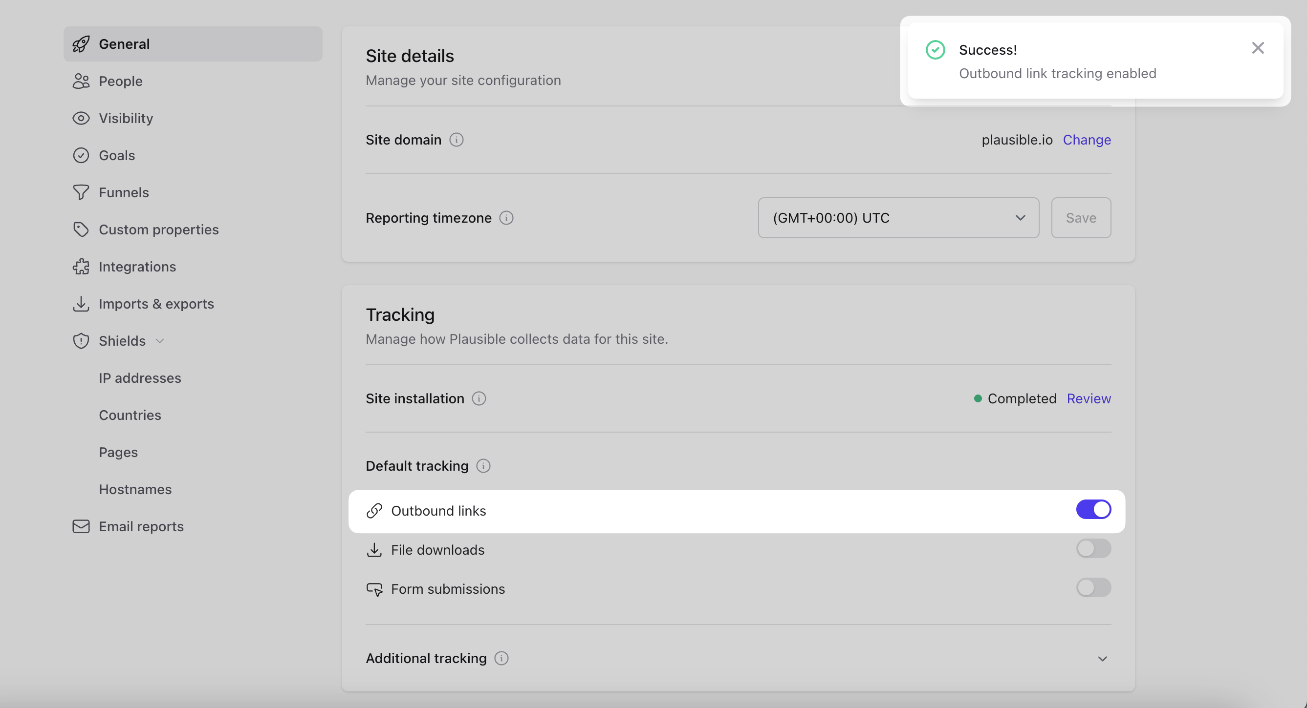 Enable outbound link tracking in Plausible site settings